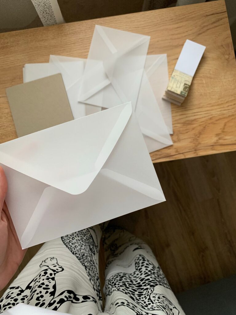 Minimalist envelopes and stationery on wooden table product photo