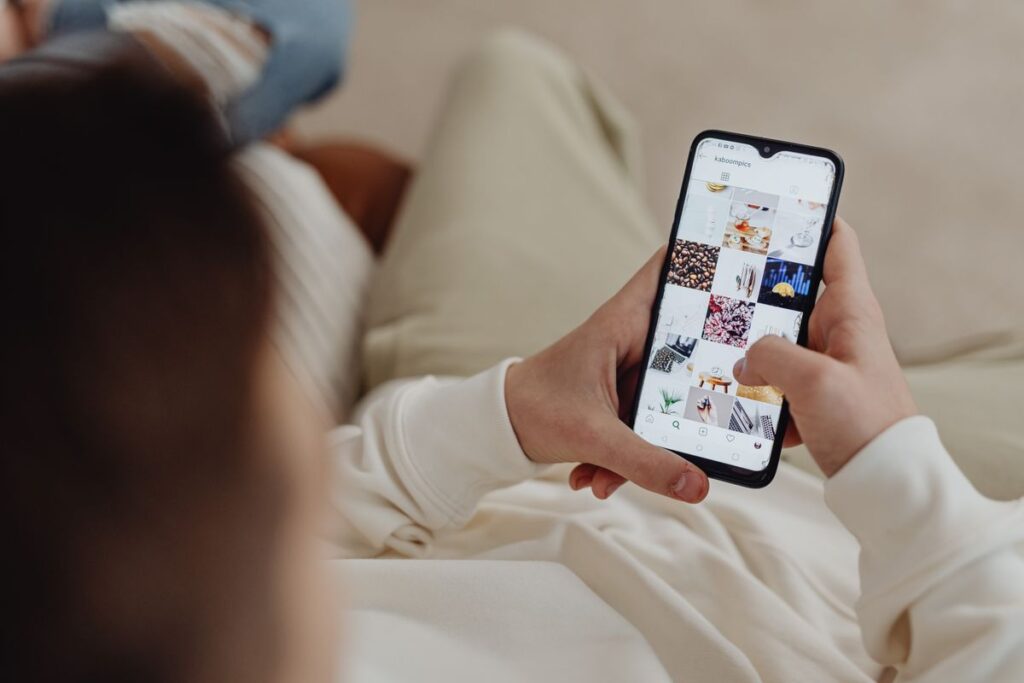 Person using phone for social media product photo