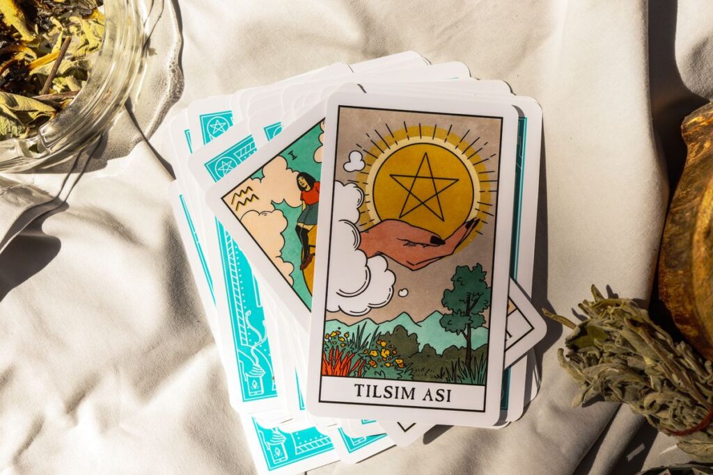 Tarot cards on white cloth product photo